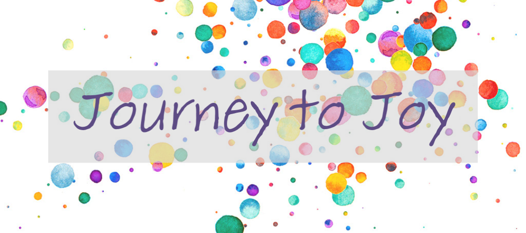 a white background with multicolored water color splatters and the text "Journey to Joy"